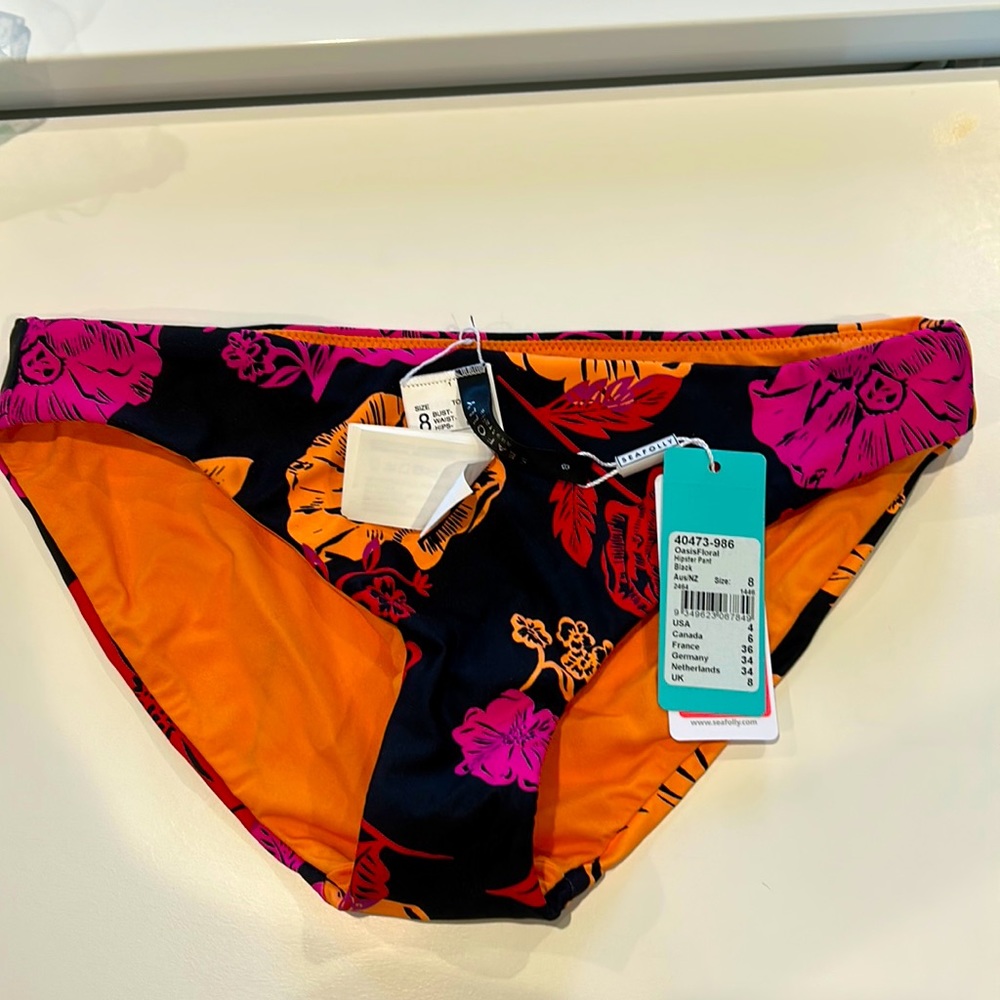 Sea folly bikini bottom, brand new never worn. Size 8.neon floral on black.